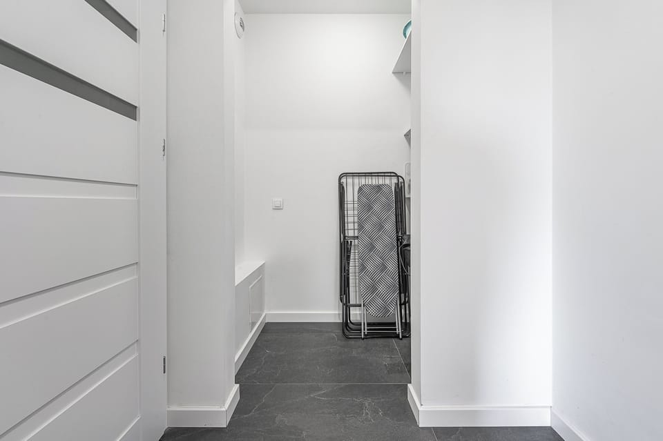 Comfort Apartment | Desk, blackout drapes, iron/ironing board, cribs/infant beds