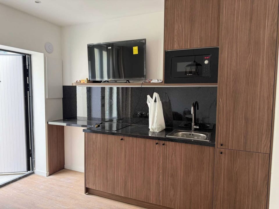 Apartment | Private kitchen | Fridge, microwave, stovetop, coffee/tea maker