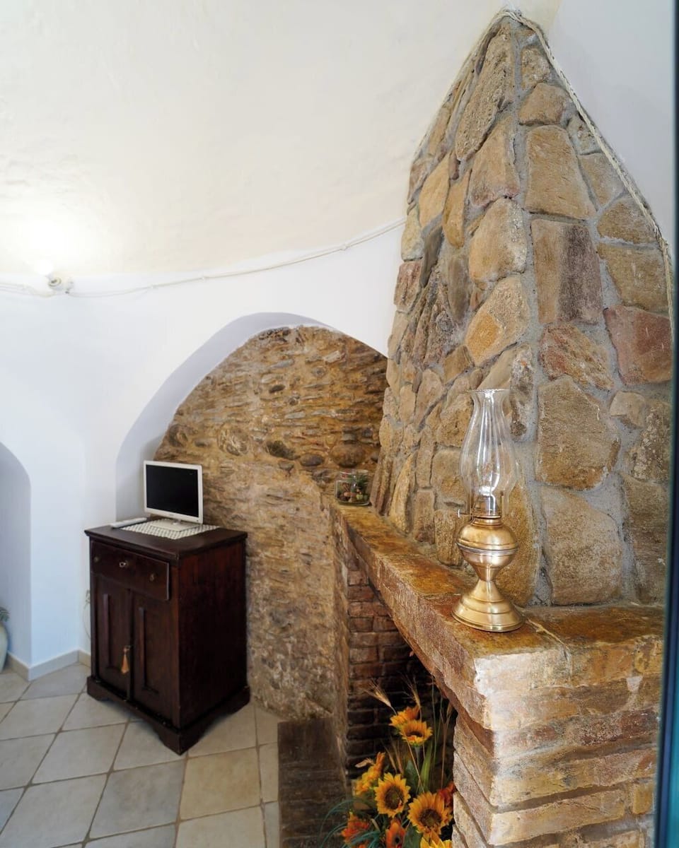Apartment, Garden View | Living area | 27-inch LCD TV with digital channels