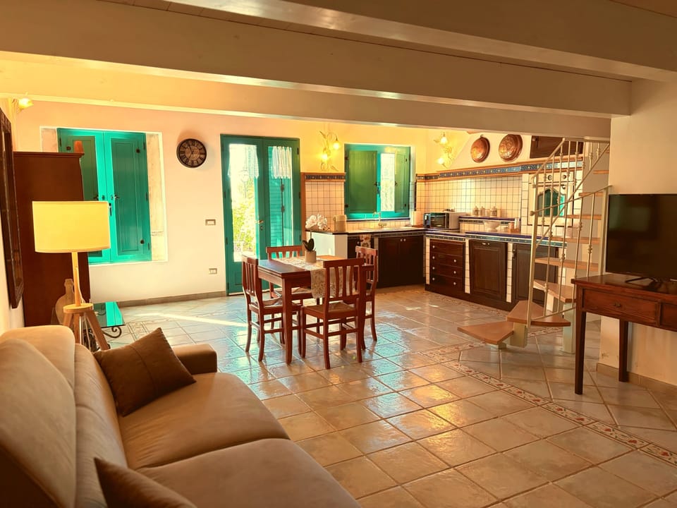 Family Apartment, Garden View | Living area | 27-inch LCD TV with digital channels