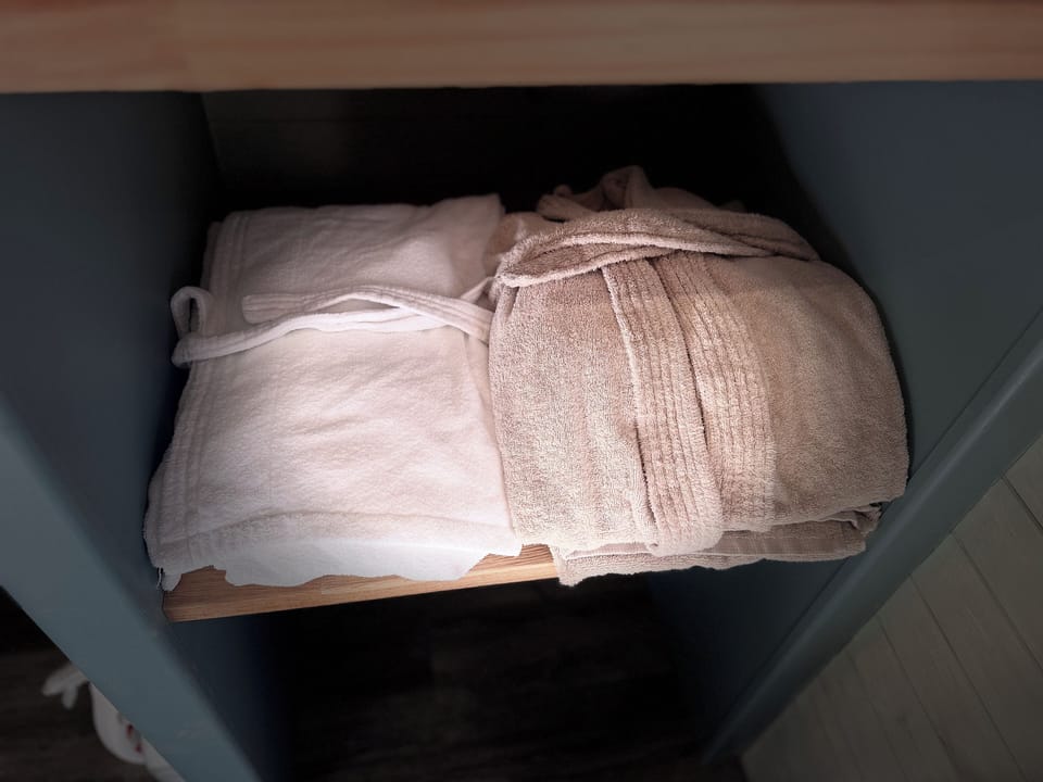 Shower, hair dryer, bathrobes, slippers