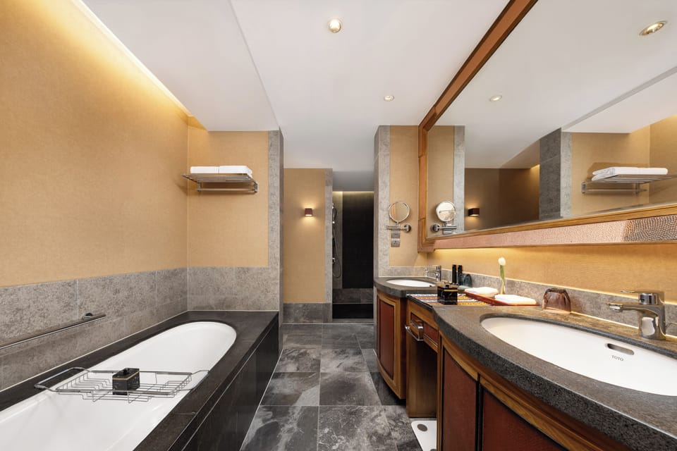Oxygen Executive Suite King | Bathroom | Separate tub and shower, rainfall showerhead, designer toiletries