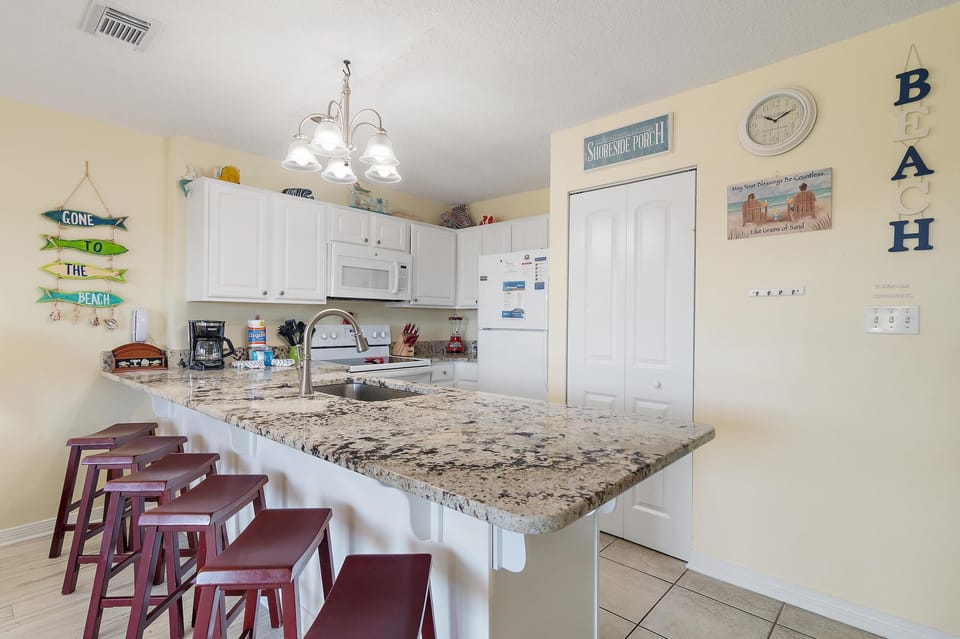 Condo, 1 King Bed with Sofa bed (Island Sands 102) | Private kitchen | Oven, toaster