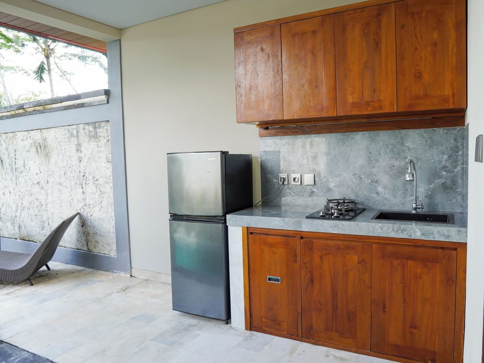 Villa | Private kitchen | Fridge, stovetop, dishwasher