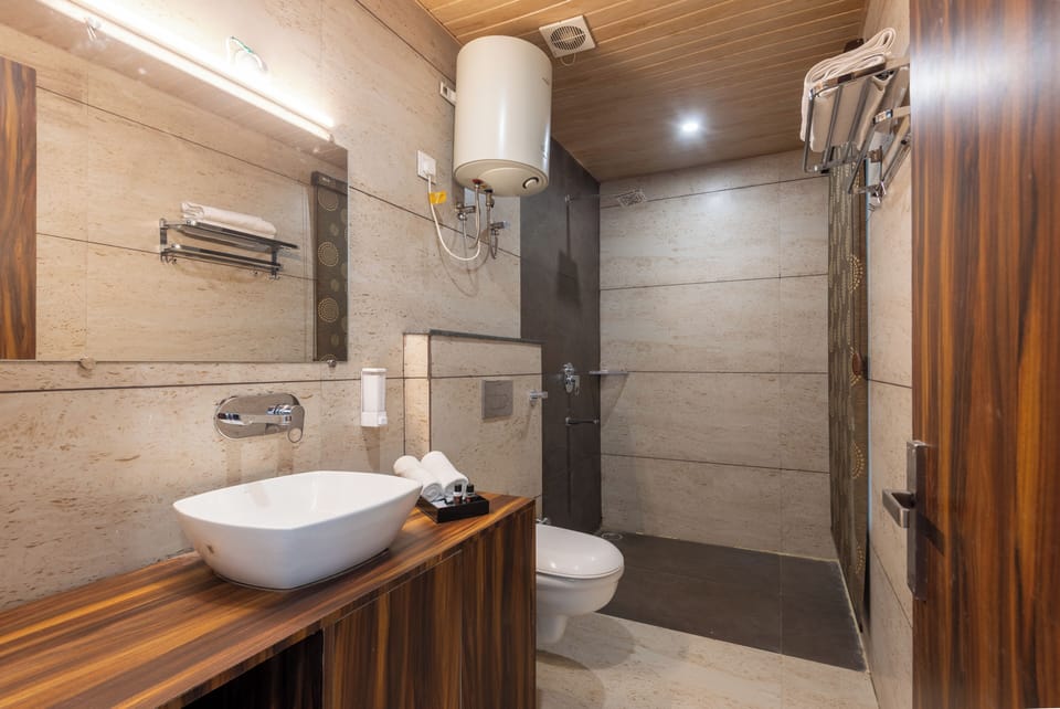 Premium Room, Balcony, Mountain View | Bathroom | Shower, slippers, towels, soap