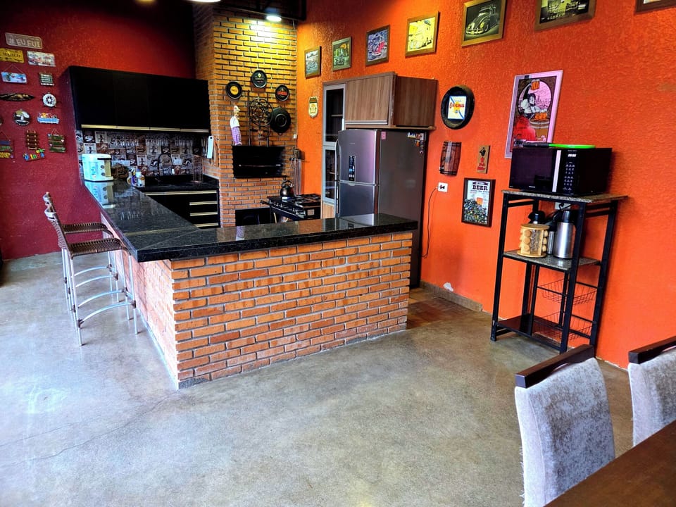 Fridge, blender, toaster oven, cookware/dishes/utensils