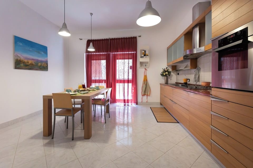 Full-size fridge, oven, stovetop, cookware/dishes/utensils