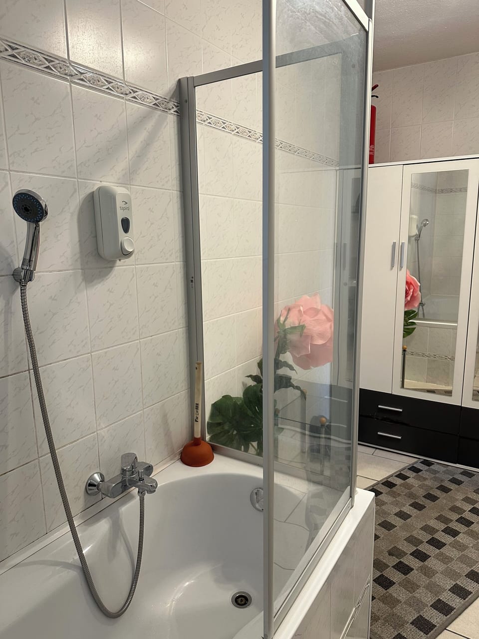 Hair dryer, slippers, towels, soap
