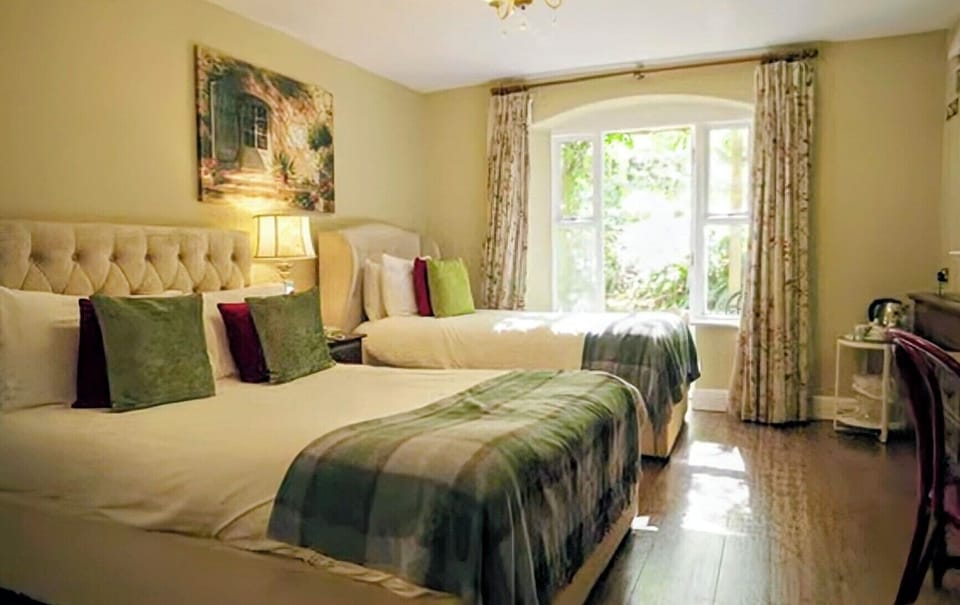 Classic Triple Room, Patio | In-room safe, individually decorated, individually furnished