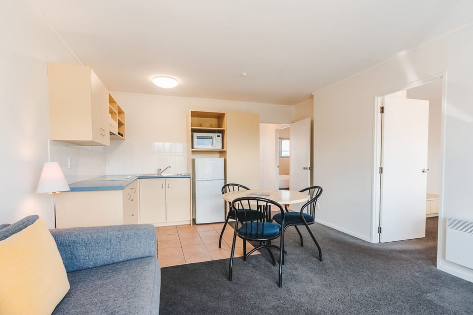Family Room, 2 Bedrooms | Living area | 32-inch TV with satellite channels