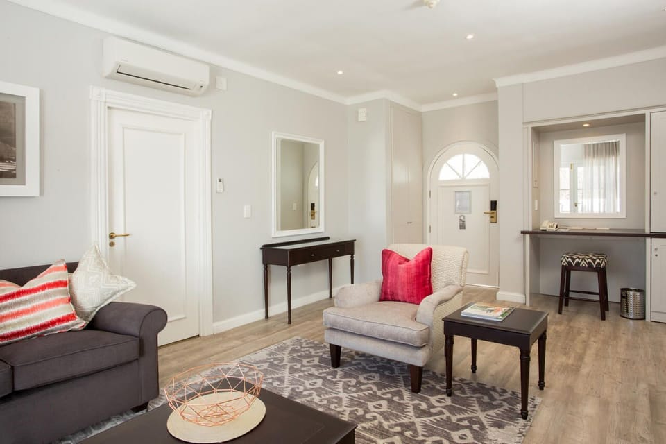 Suite, 1 Bedroom | Living area | 55-inch flat-screen TV with satellite channels, DVD player