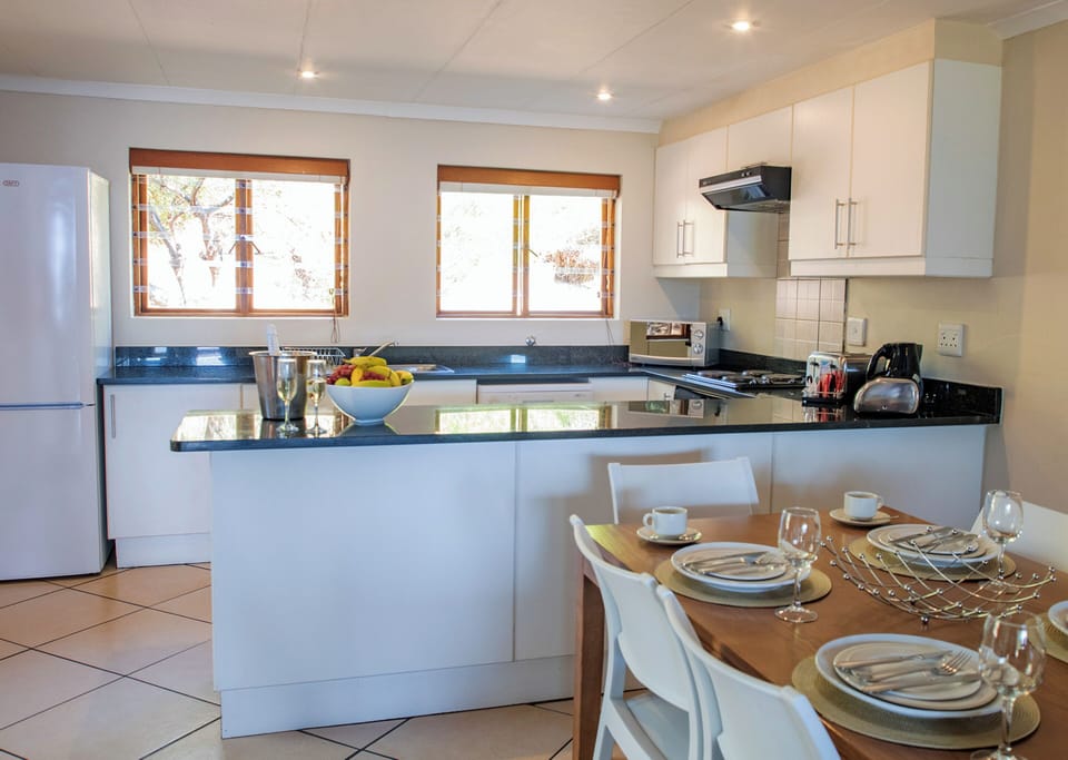 Coffee/tea maker, electric kettle, dining tables