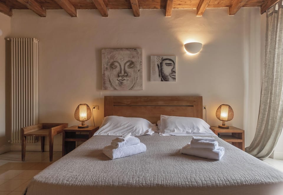 Triple Room | Minibar, cribs (free), WiFi (free), bed sheets
