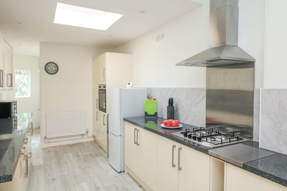 Fridge, microwave, toaster, cookware/dishes/utensils