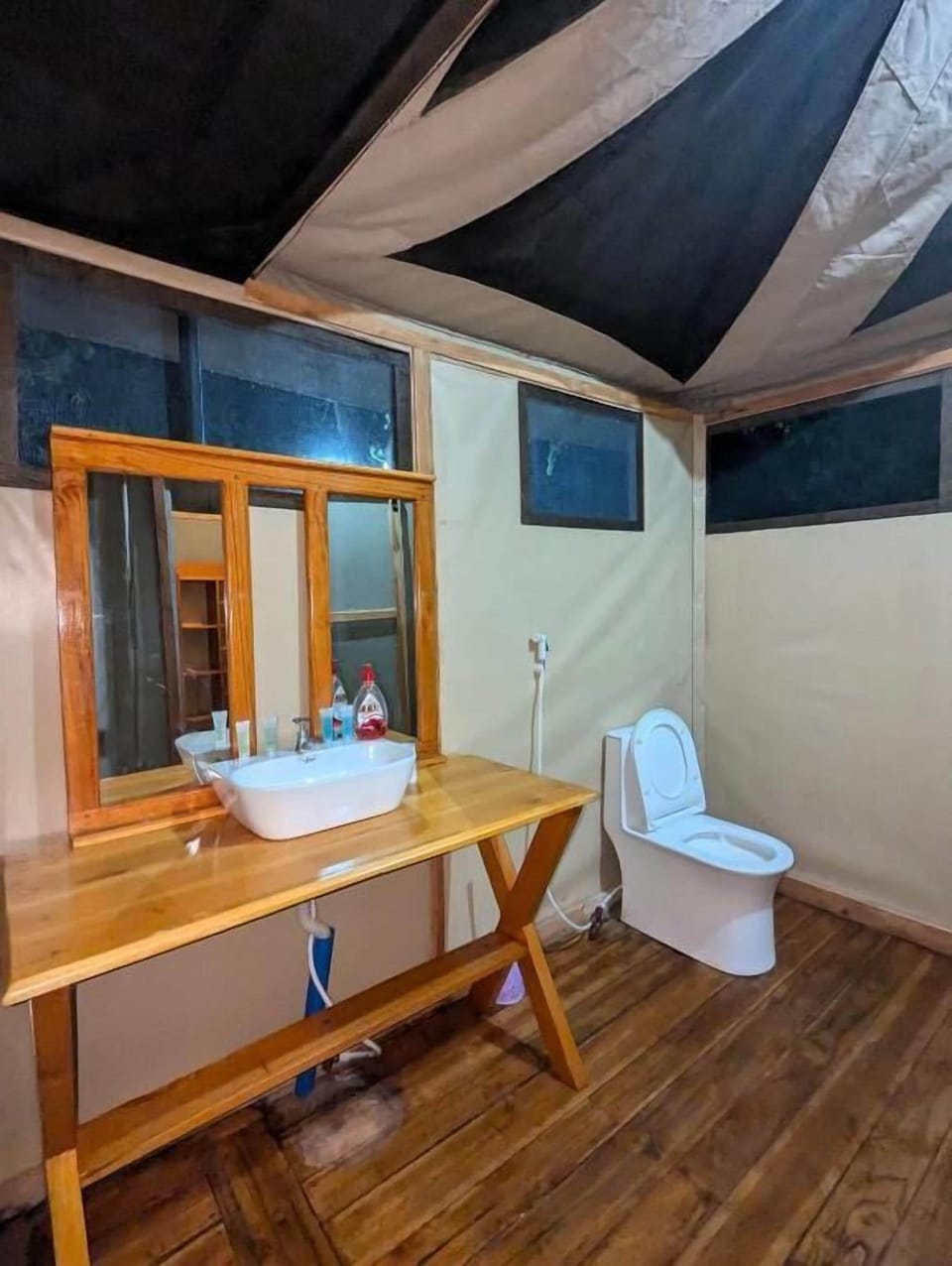 Bathtub, hair dryer, slippers, towels