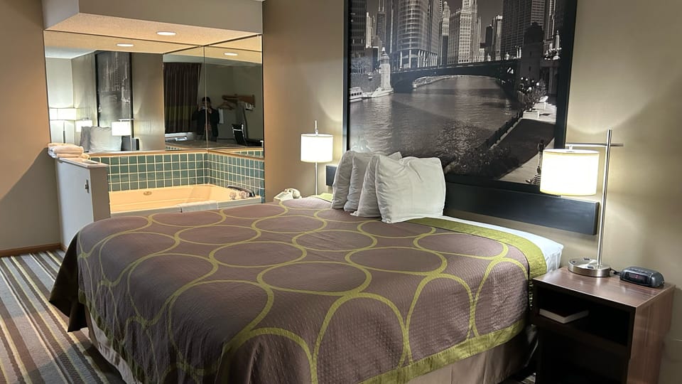 Desk, laptop workspace, iron/ironing board, free cribs/infant beds