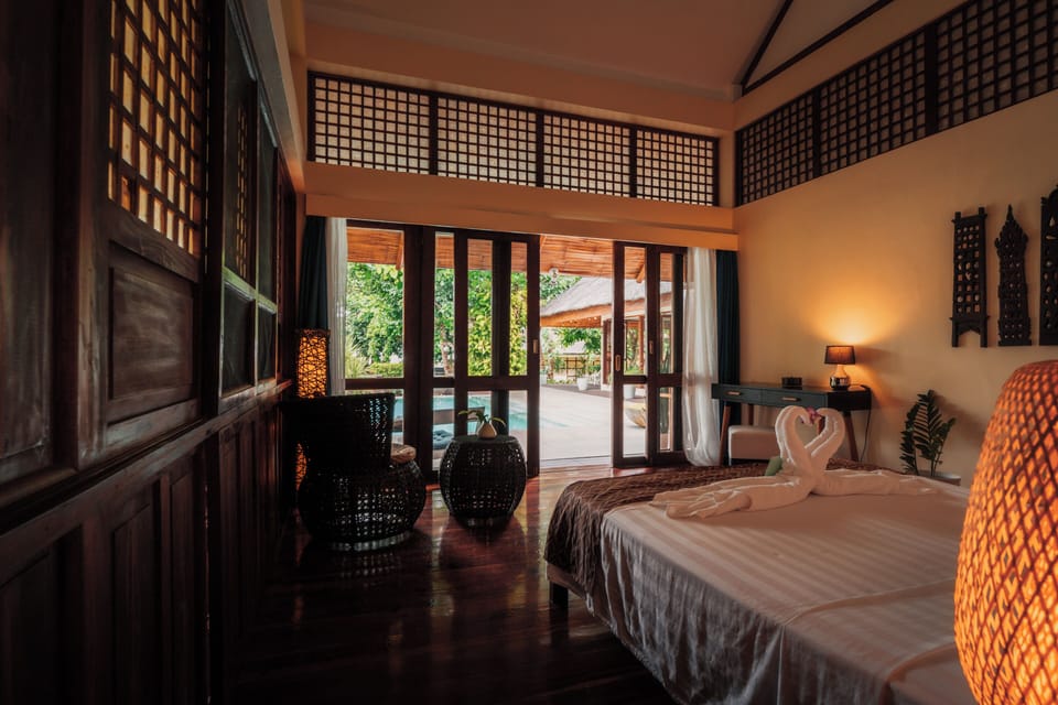 Room (Pool View Queen) | Minibar, in-room safe, individually decorated, individually furnished