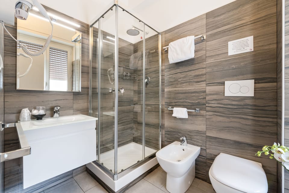 Shower, free toiletries, hair dryer, bathrobes