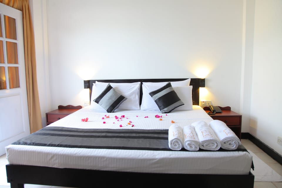 Standard Double Room, Balcony, Garden View | Desk, iron/ironing board, free WiFi