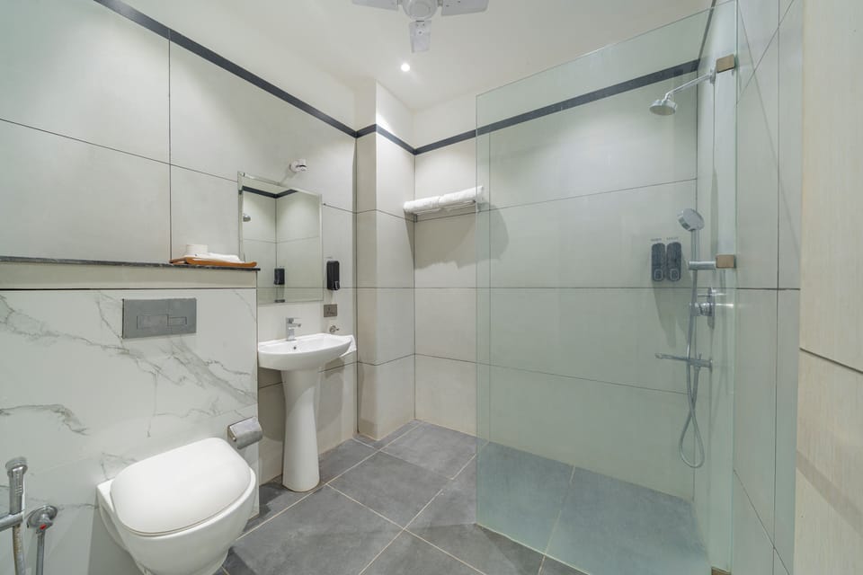 Shower, rainfall showerhead, eco-friendly toiletries, hair dryer