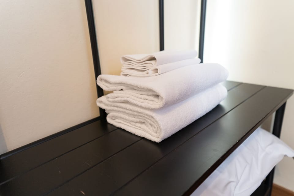 Economy Twin Room, 2 Twin Beds, Shared Bathroom | Room amenity