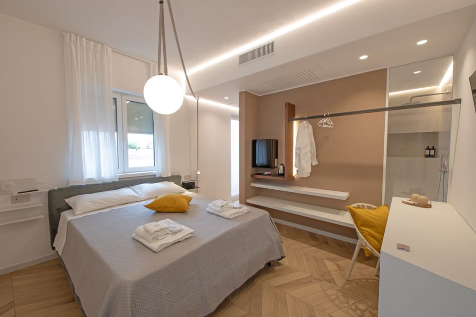 Classic Double Room, Patio | Memory foam beds, desk, laptop workspace, blackout drapes