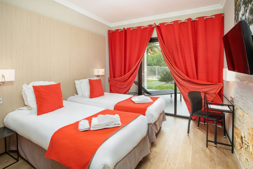 Twin Room, Balcony | In-room safe, desk, iron/ironing board, free WiFi