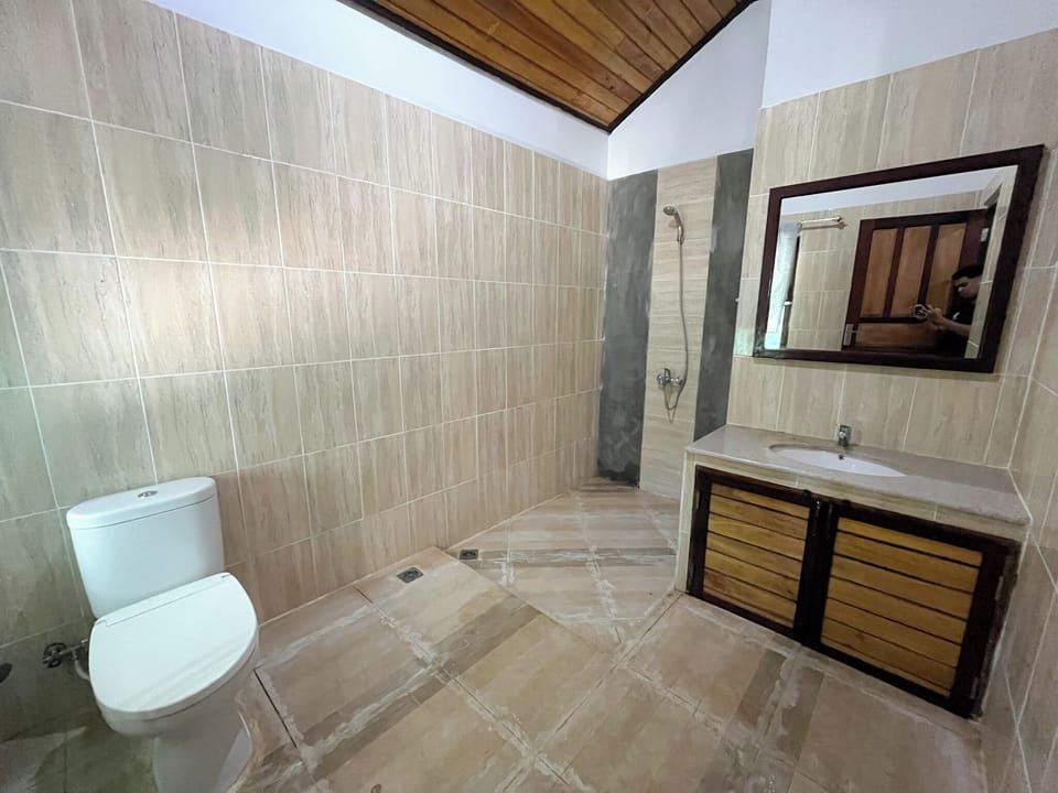 Family Bungalow, Ocean View | Bathroom | Shower, bidet, towels, shampoo