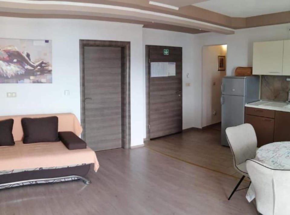 Apartment (Two Bedroom Apartment with Balcony) | Living room | 32-inch flat-screen TV with satellite channels, DVD player