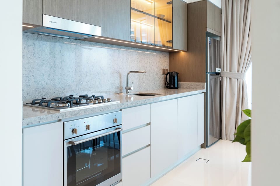 Deluxe Apartment, Balcony, Sea View | Private kitchen | Full-size fridge, microwave, oven, stovetop