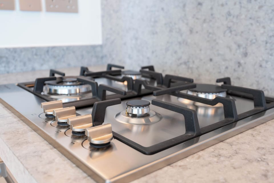 Deluxe Apartment, Balcony, Sea View | Private kitchen | Full-size fridge, microwave, oven, stovetop