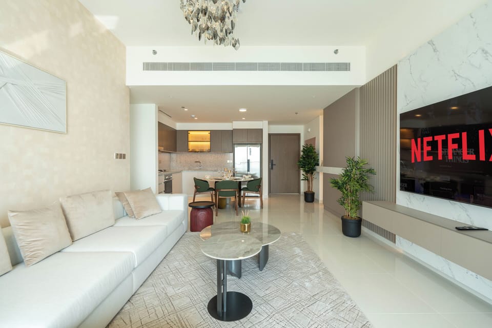 Deluxe Apartment, Balcony, Sea View | Living area | 125-cm flat-screen TV with digital channels, Netflix, streaming services