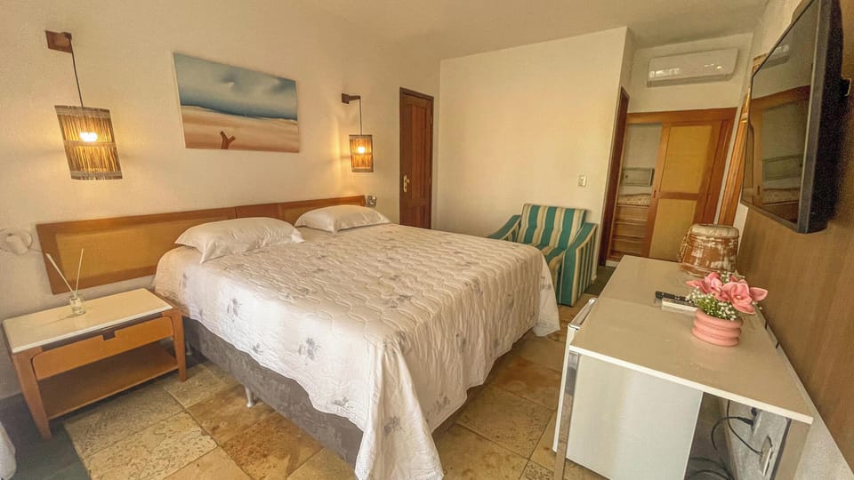 Quadruple Room, Pool View | In-room safe, blackout drapes, bed sheets