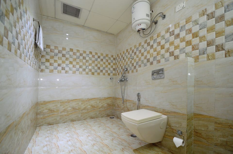 Shower, slippers, bidet, towels
