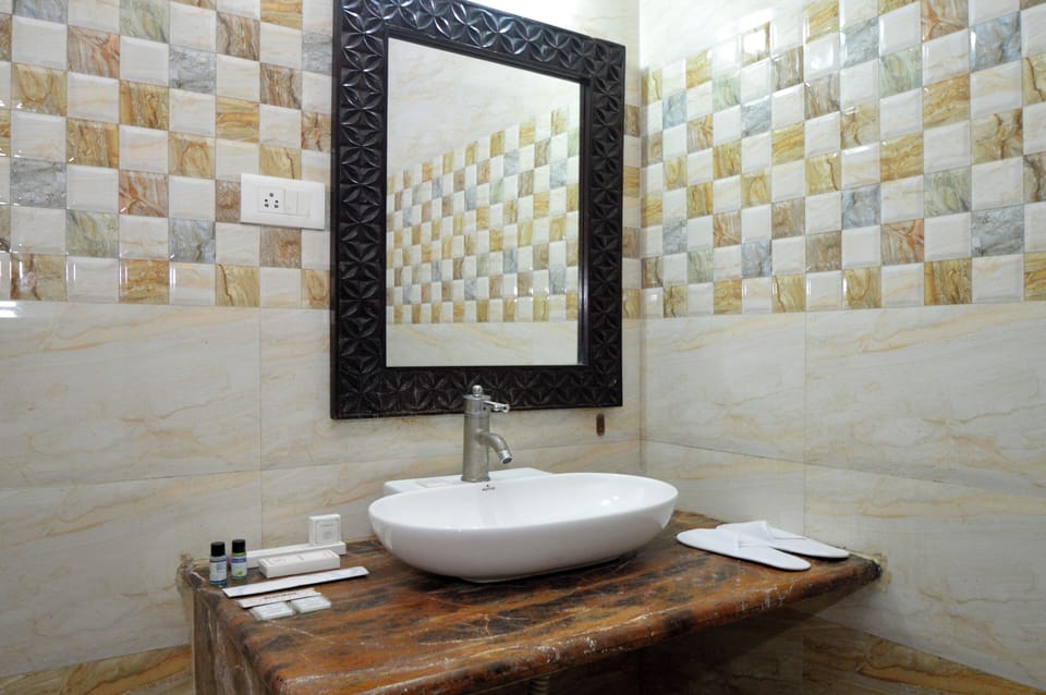 Shower, slippers, bidet, towels