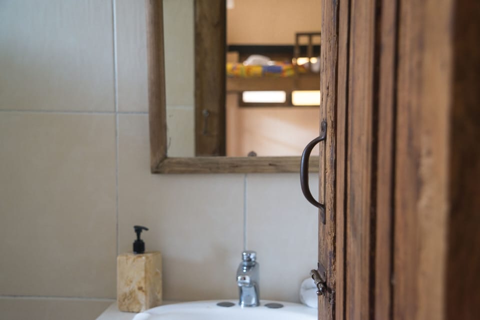 Private Triple Room | Bathroom | Shower, hair dryer, towels