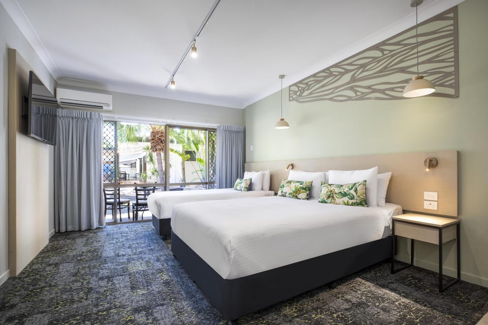 Family Studio | Desk, iron/ironing board, alarm clocks, bed sheets