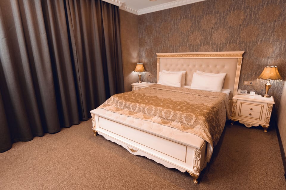 Deluxe Double Room, 1 King Bed, City View | Minibar, in-room safe, desk, laptop workspace
