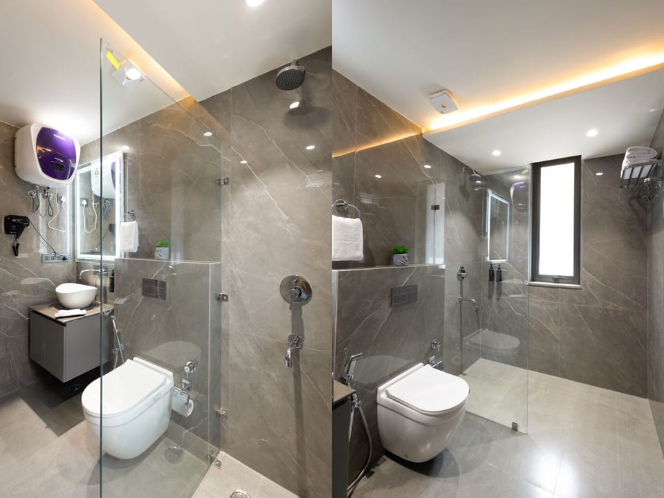 Shower, rainfall showerhead, free toiletries, hair dryer