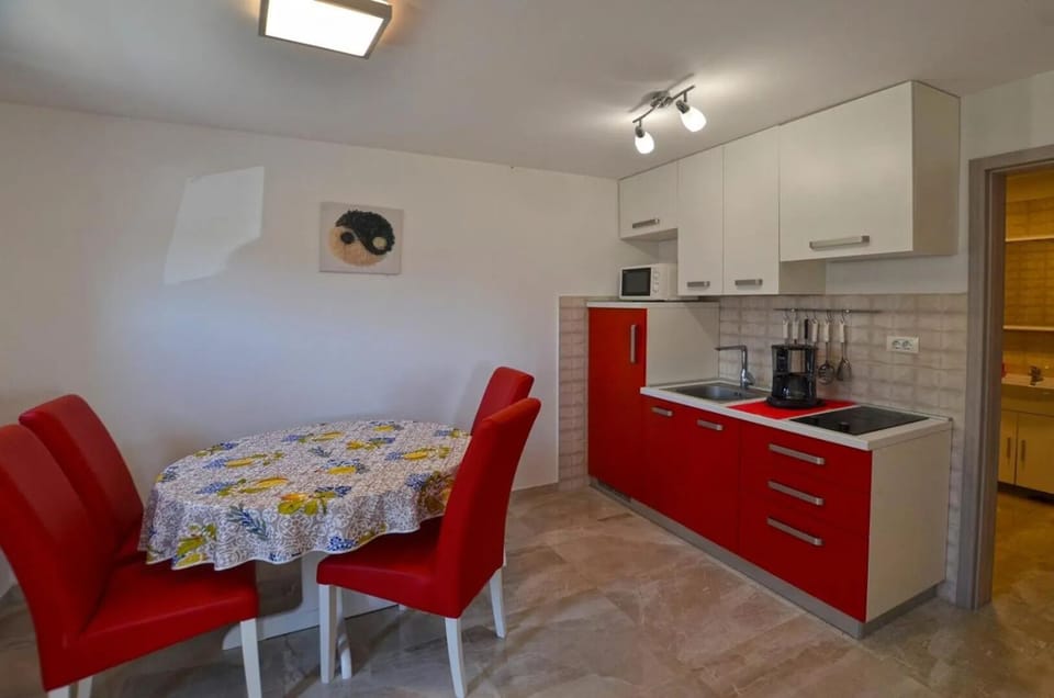 Apartment, Balcony, Sea View | Private kitchen | Coffee/tea maker, electric kettle, toaster, freezer