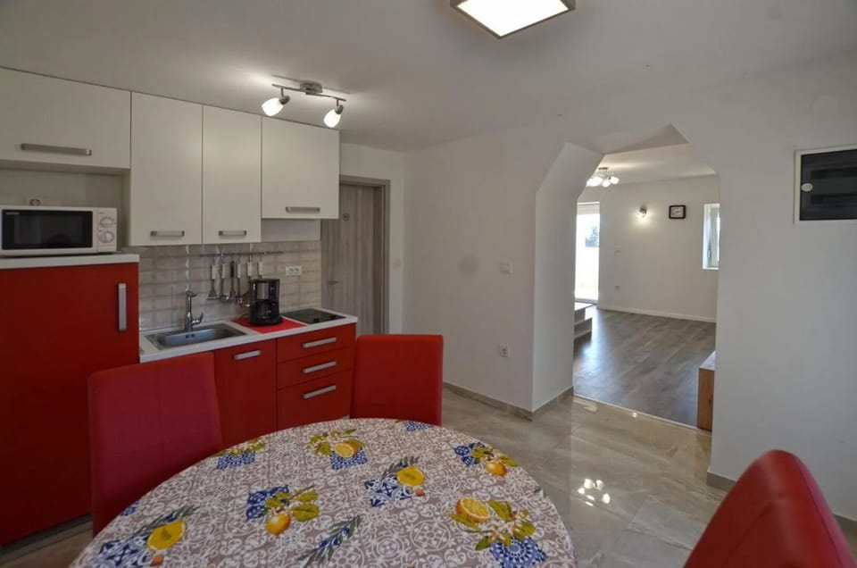 Apartment, Balcony, Sea View | Private kitchen | Coffee/tea maker, electric kettle, toaster, freezer