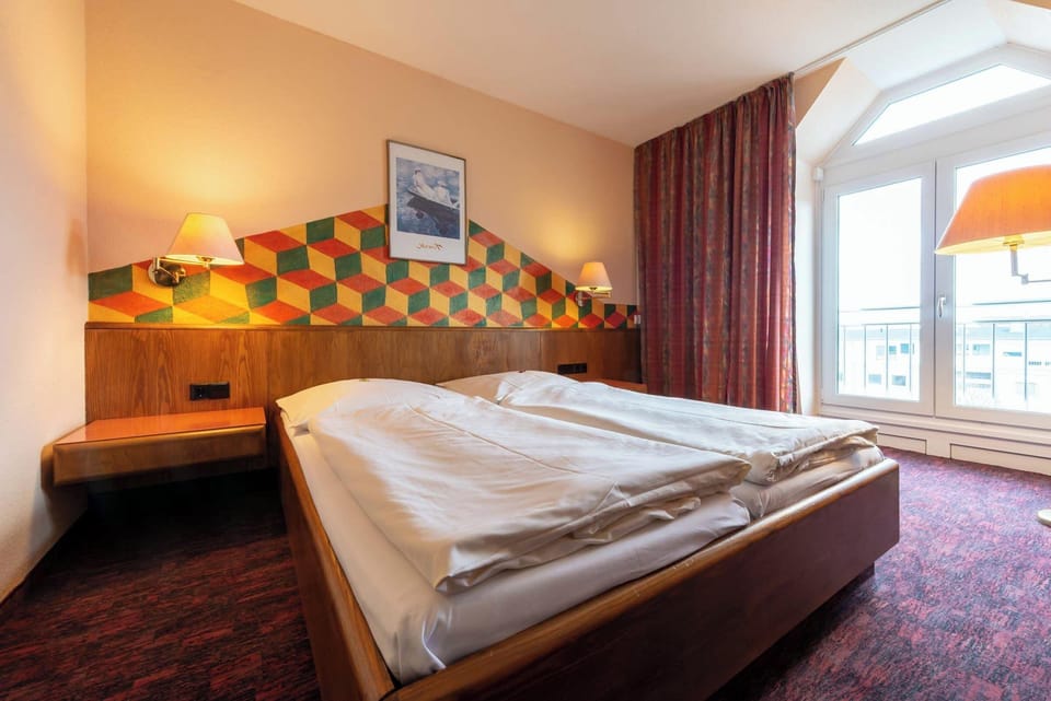 Superior Double Room, City View | Blackout drapes, soundproofing, iron/ironing board, WiFi