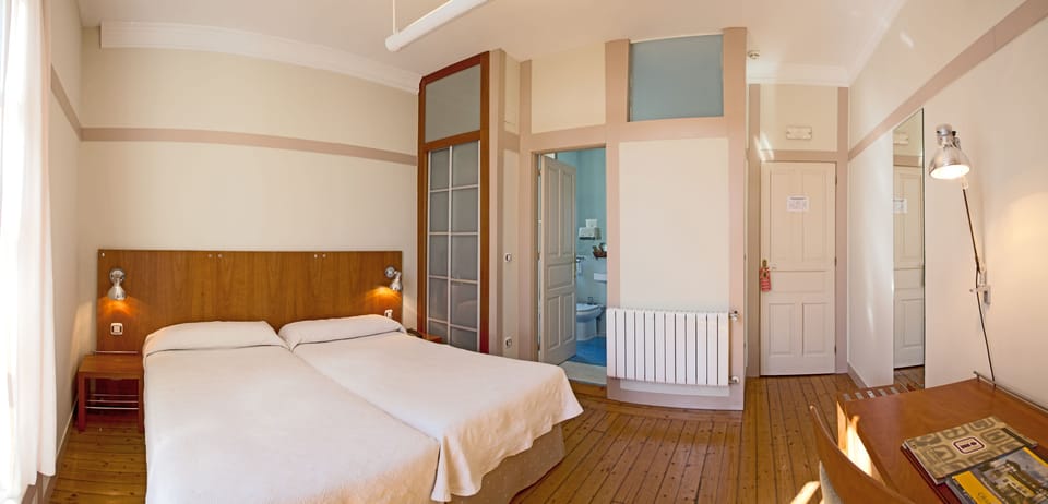 Double or Twin Room | Minibar, in-room safe, desk, blackout drapes