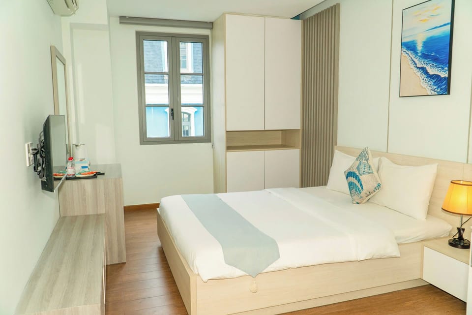 Deluxe Double Room, City View | Minibar, blackout drapes, soundproofing, free WiFi