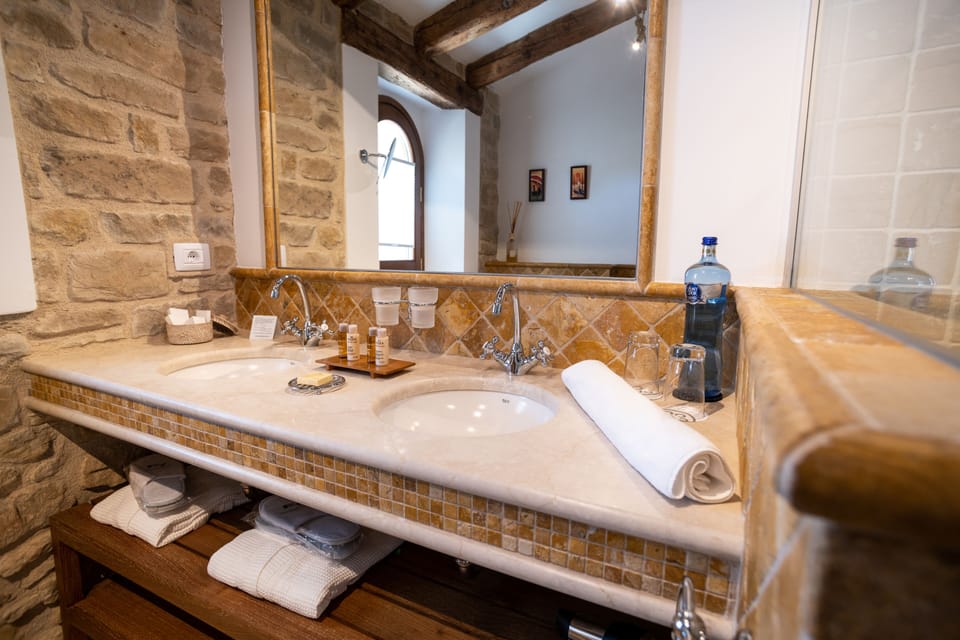 Suite | Bathroom | Shower, rainfall showerhead, designer toiletries, hair dryer