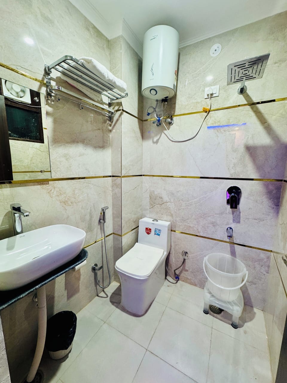 Shower, designer toiletries, slippers, heated floors
