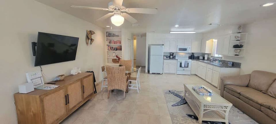 Condo, Multiple Beds, Patio, Pool View (Campeche Retreat #12) | Living area | 42-inch flat-screen TV with digital channels