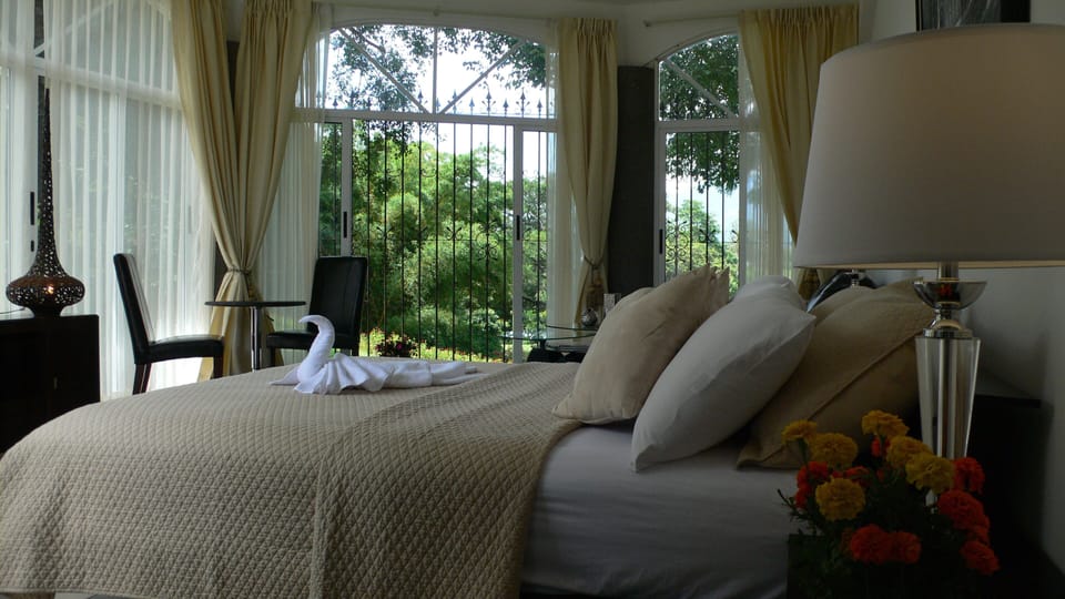 Deluxe Quadruple Room, Pool Access, Golf View | Minibar, in-room safe, laptop workspace, WiFi (free)