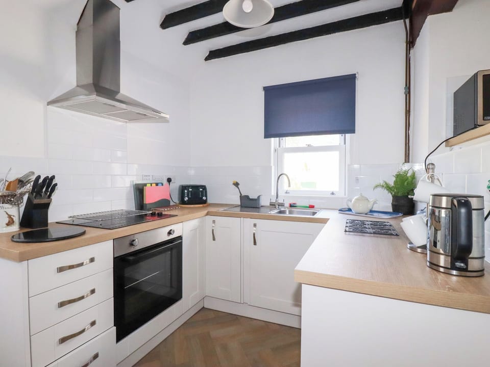 Fridge, microwave, toaster, cookware/dishes/utensils