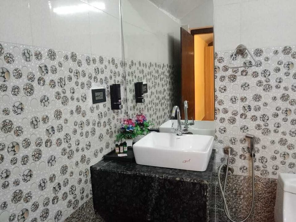 Deluxe Double Room, Patio, Garden View | Bathroom | Shower, free toiletries, hair dryer (on request), slippers